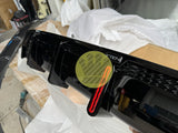Gloss black rear diffuser with brake light - G26 4 Series